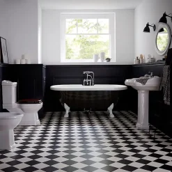 Planète Bain Baignoire ilot Charly ovale noire et blanche avec piétements blanc* Baignoire Îlot