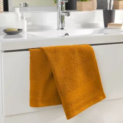 Douceur D'Intérieur Serviette de Toilette unie 50x90 cm - Collection Tendresse - Éponge 500 g,m² - 50x90cm - Curry